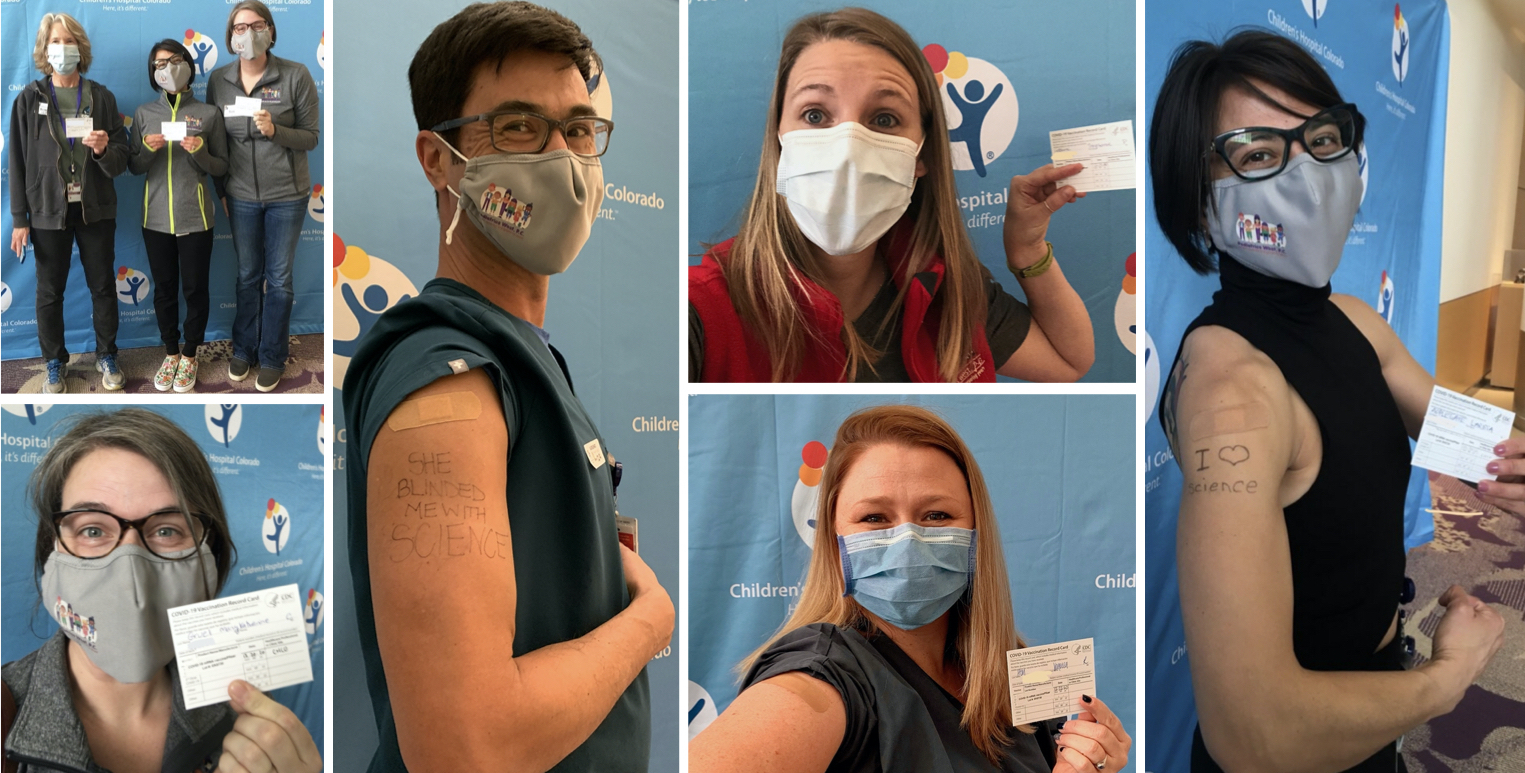 Providers showing their COVID-19 vaccine cards