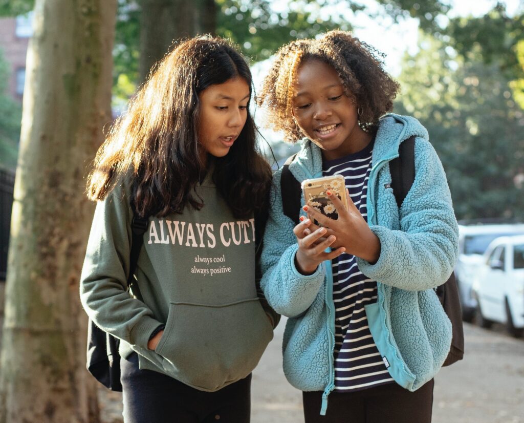 Kids looking at their own phone