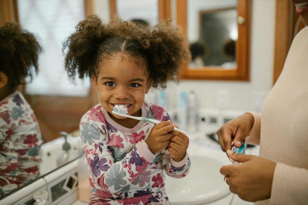 A child brushing her teeth.